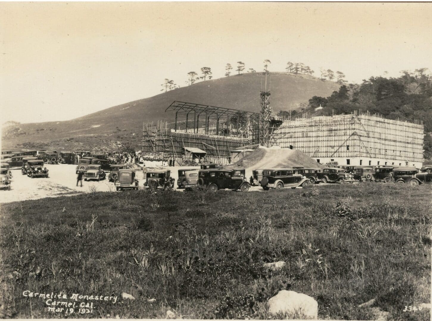 A black and white photo of an old farm.